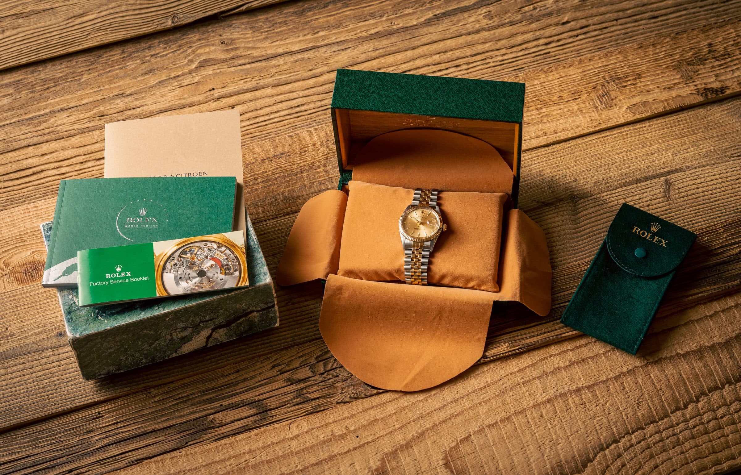 Rolex with its original box, papers and pouch